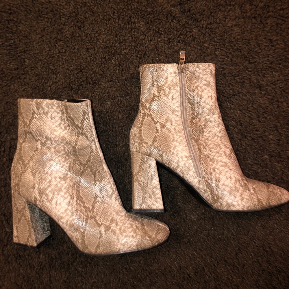 Snakeskin booties.
